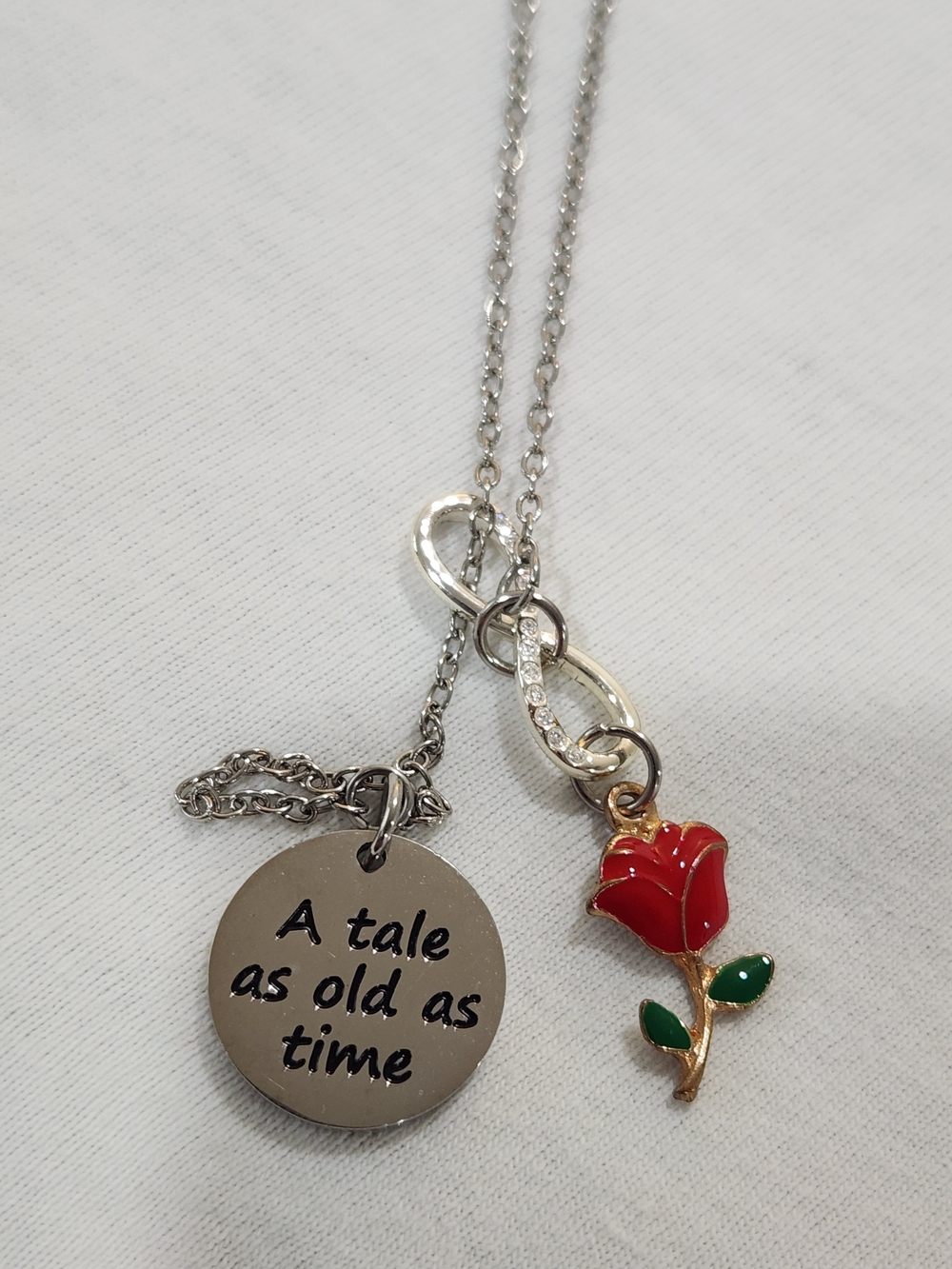 Silver Tone 'A Tale as Old as Time' Necklace with Red Rose Charm